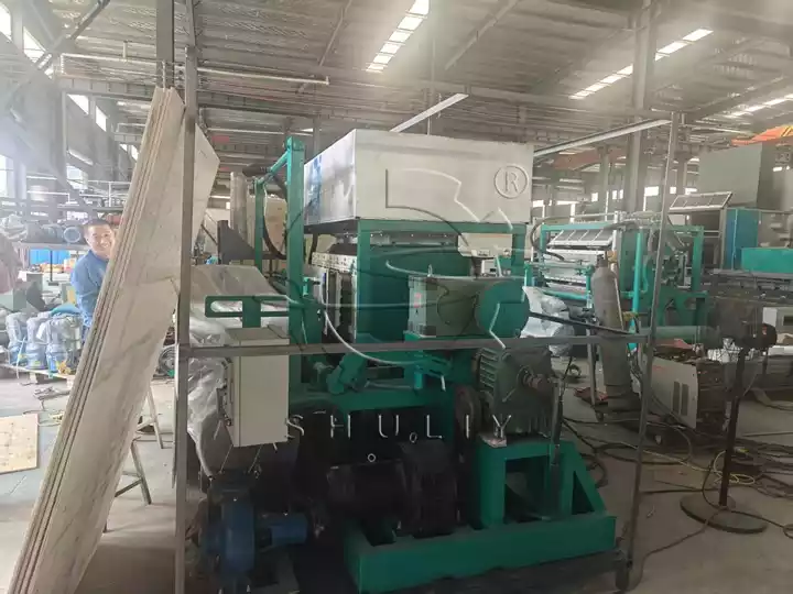Projeto de Caixa de Ovos no Afeganistão – Redução de Custos de Importação e Aumento da Eficiência Agrícola 1 local de embalagem da linha de produção de caixas de ovos
