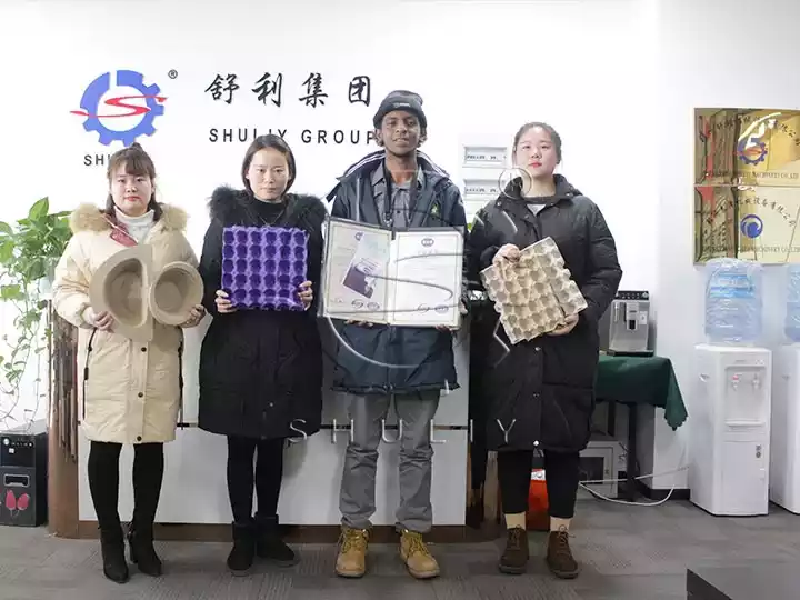 How Much Does It Cost To Set Up An Egg Tray Production Line? 3 Customer visiting for egg tray machine