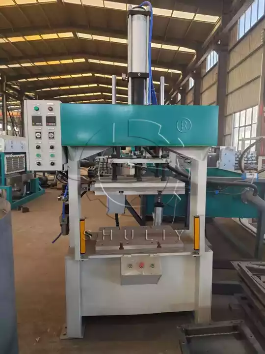 Hot-press moulding machine