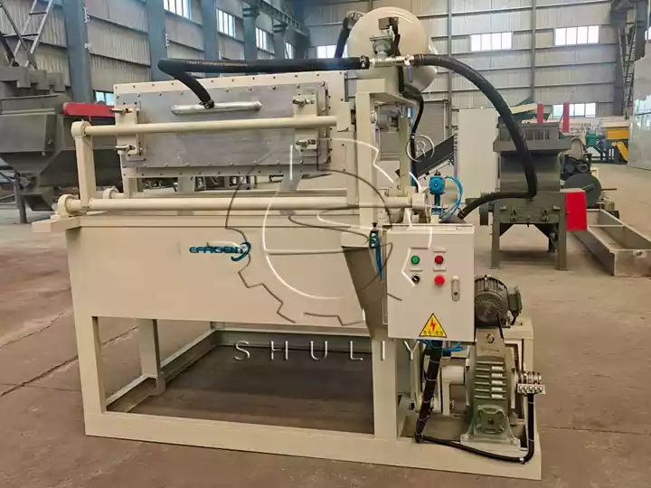 Egg tray making machine in workshop